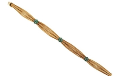An Italian emerald set gold bracelet, designed as …