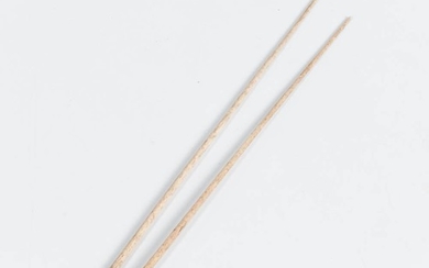 Pair of Whalebone Knitting Needles, 19th century, with carved tops, lg. 12 1/2 in.Note: This item may be subject to state and federal l