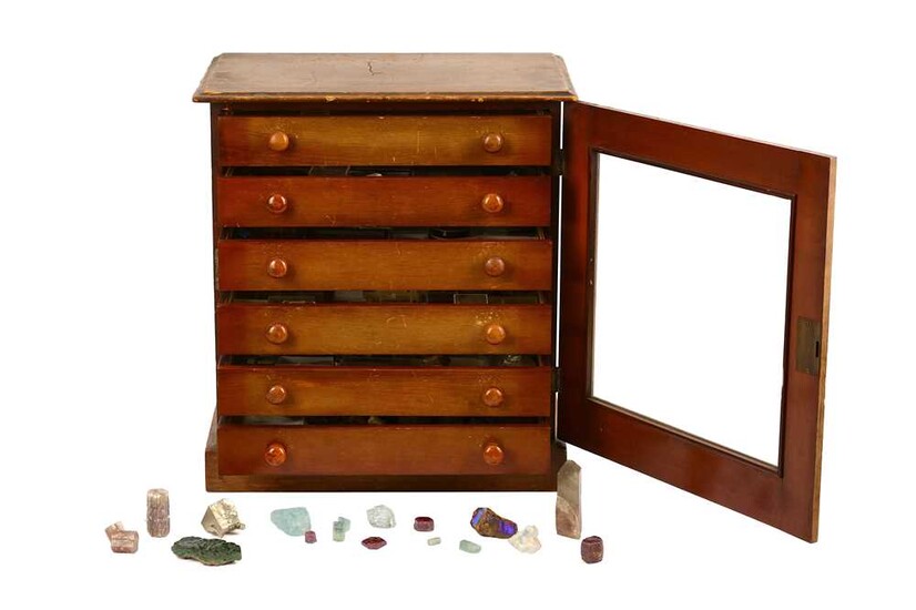 A collector's chest of loose gemstones and minerals The...