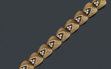 Bracelet in 18K yellow gold with brilliants