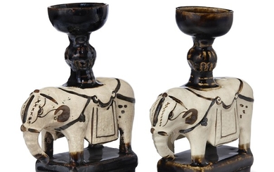 A PAIR OF CIZHOU-TYPE BROWN AND CREAM-GLAZED 'ELEPHANT' INCENSE STICK HOLDERS, MING-EARLY QING DYNASTY