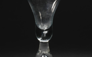 A heavy baluster small wine glass, circa 1720-30