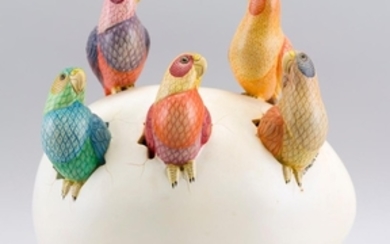 SERGIO BUSTAMANTE, Mexico, b. 1942/43, Five colorful parakeets hatching from one large egg., Porcelain, height 11". Length 14". Dept...