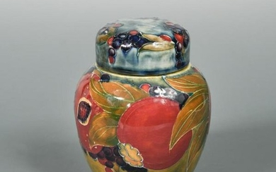 A small early Moorcroft Pomegranate pattern jar and