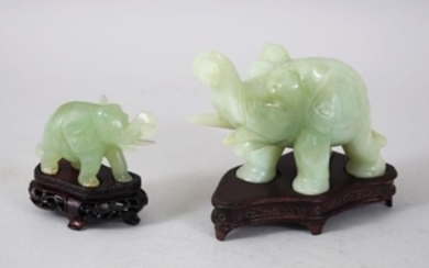 TWO 20TH CENTURY CHINESE JADE ELEPHANT FIGURES WITH
