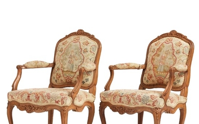 A matched pair of French Louis XV armchairs, mid 18th century.