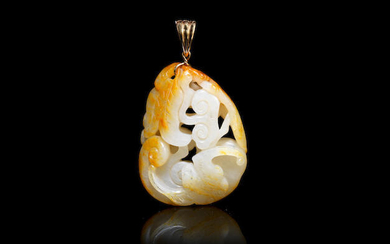 A white and russet jade 'squirrel and grapevine' pendant