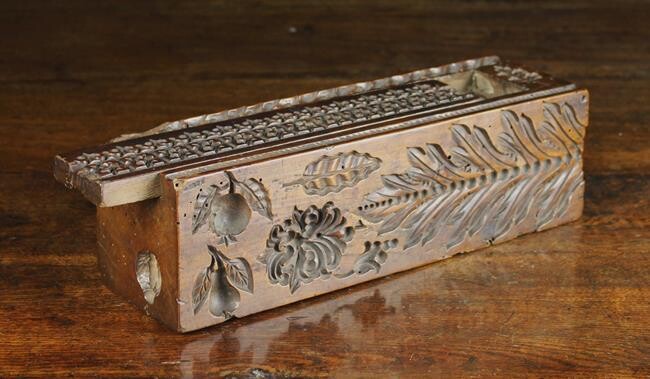 A Rare Antique Dug-out Treen Mould Box. The long