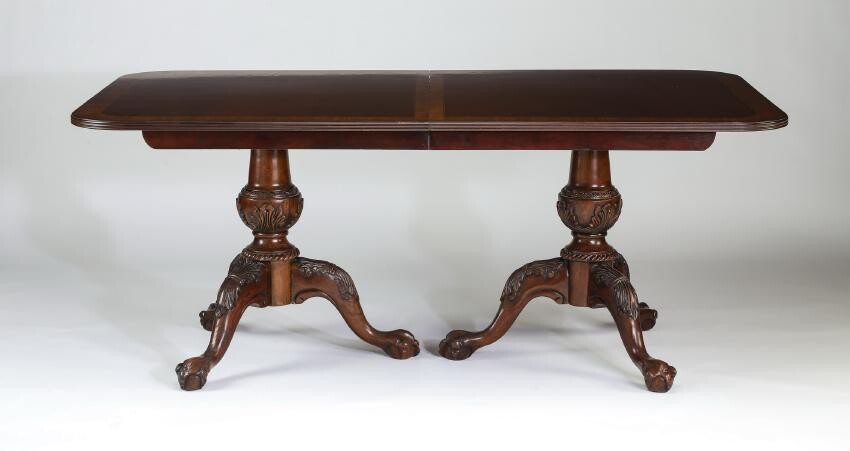 Chippendale style mahogany dining table w/ leaf