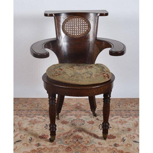 A 19TH CENTURY MAHOGANY COCK FIGHTING CHAIR the shaped top r...