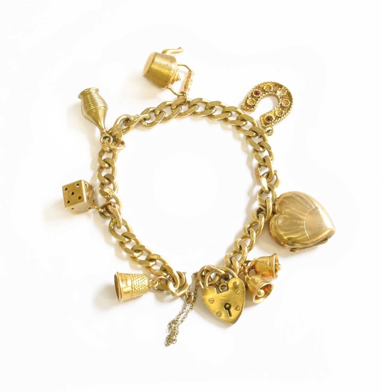A 9 Carat Gold Curb Link Bracelet, hung with various...