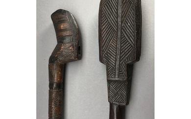 ‡A CARVED AUSTRALASIAN CLUB AND A CARVED AXE HAFT