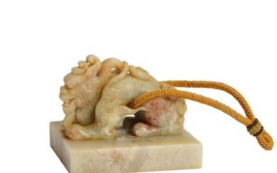 A CARVED SOAPSTONE BEAST SEAL