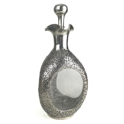 A CHINESE SILVER AND CLEAR GLASS DIMPLE DECANTER AND STOPPER...