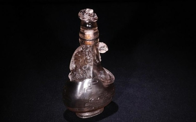 A CRYSTAL CARVED DRAGON PATTERN SNUFF BOTTLE