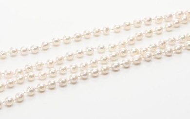 A CULTURED PEARL NECKLACE, PEARLS MEASURING FROM 7.48 TO 8.33MM, THE CLASP SET WITH A CABOCHON CORAL AND DIAMOND IN 9CT GOLD, TOTAL...