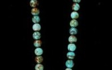 A Chinese Turquoise and Mammoth Ivory Necklace