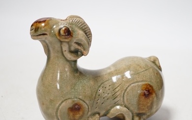 A Chinese Yue type green glazed model of a ram, 10cm wide...