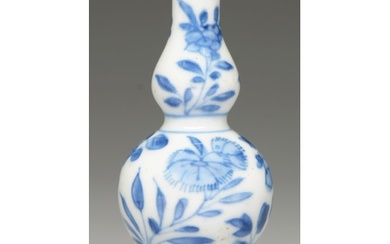 A Chinese blue and white double gourd vase, 18th c, painted ...