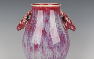 A Chinese flambé glazed hu-shaped porcelain vase, 20th century, the pear-form body moulded with