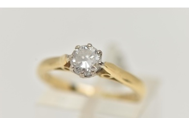 A DIAMOND SINGLE STONE RING, set with a round brilliant cut ...