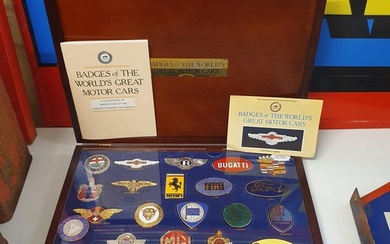 A Danbury Mint display set of Badges of the World's Great Mo...