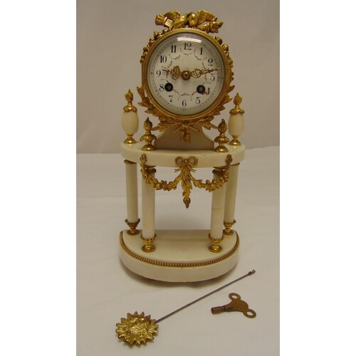 A French gilt metal and white marble clock, of architectural...