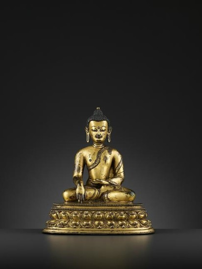 A GILT BRONZE OF BUDDHA SHAKYAMUNI TIBET 15TH CT.