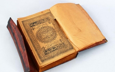 A GOOD 19TH CENTURY ISLAMIC LEATHER-BOUND BOOK OF QURAN