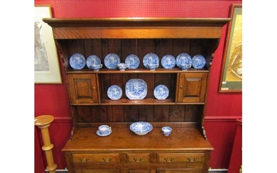 A George III style oak Welsh dresser with raised shelved bac...