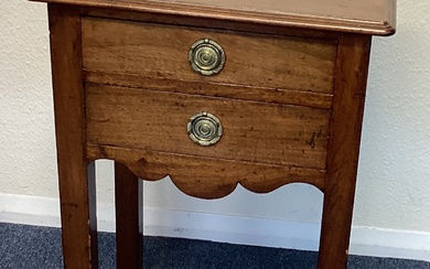 A Georgian mahogany two-drawer side table.