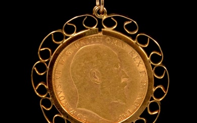 A Gold Full Sovereign Coin pendant and chain.