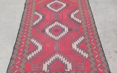 A HAND KNOTTED PURE WOOL PERSIAN BALUCHI
