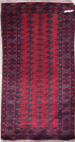 A HAND KNOTTED PURE WOOL PERSIAN BUKHARA