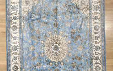 A HANDKNOTTED PURE SILK AND WOOL MULTI BLUE FLORAL QARDEN RUG