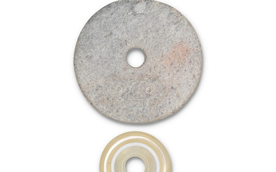 A JADE DISC, BI AND TWO AGATE RINGS Neolithic period,...