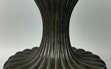 A JAPANESE BRONZE VASE IN THE FORM OF A...