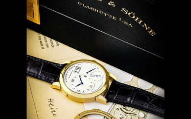 A. LANGE & SÖHNE. AN EXTREMELY EARLY, RARE AND IMPORTANT 18K GOLD WRISTWATCH WITH OVERSIZED DATE, POWER RESERVE INDICATOR, BLUED HANDS AND ADDITIONAL SAPPHIRE CRYSTAL CASE BACK LANGE 1 MODEL, REF. 101.002, MOVEMENT NUMBER 107, CASE NUMBER 110076, CIRCA...