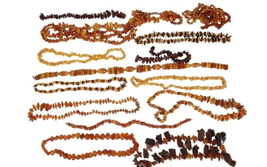 A LARGE COLLECTION OF BALTIC SHARD AMBER* BEAD NECKLACES