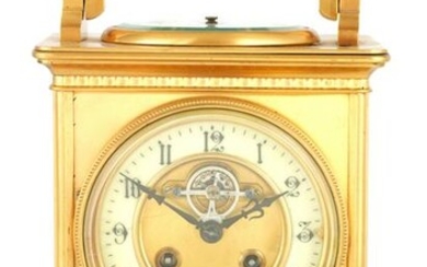 A LARGE FRENCH GILT BRASS CARRIAGE CLOCK WITH BARO