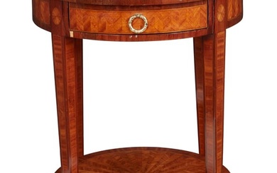 A Louis XVI style mahogany and satinwood gueridon