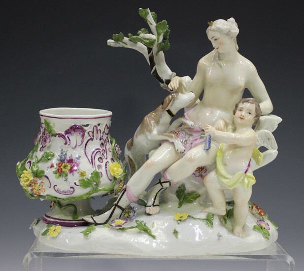 A Meissen figural potpourri, mid to late 18th century, modelled as Diana and Cupid accompanied by a