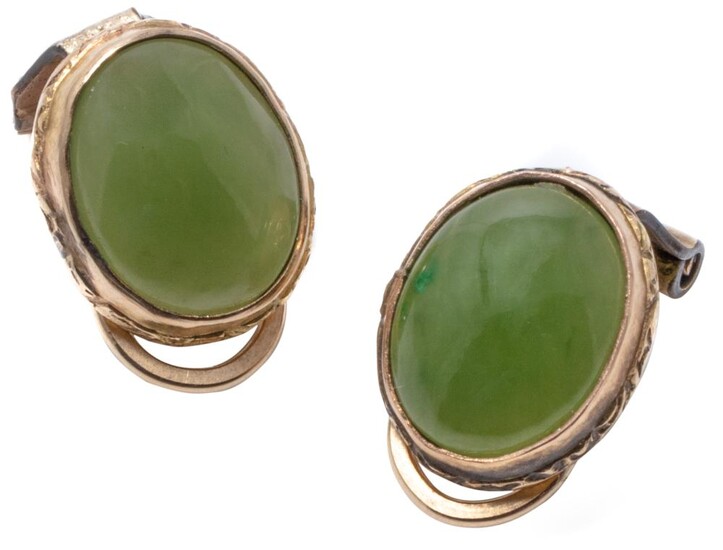 A PAIR OF 9CT GOLD JADE EARRINGS; each a 10 x 8mm cabochon nephrite jade to clip fitting, wt. 2.76g.