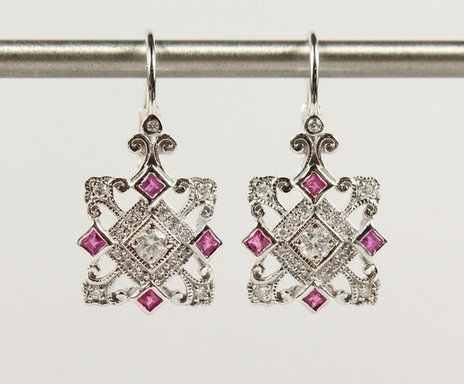 A PAIR OF 9CT GOLD, RUBY AND DIAMOND DROP EARRINGS.