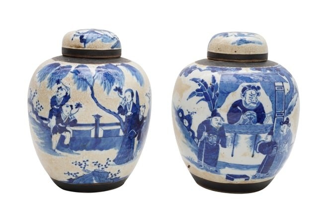 A PAIR OF CHINESE BLUE AND WHITE JARS AND COVERS