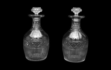 A PAIR OF GEORGE III CUT GLASS DECANTERS OF MALLET SHAPE, CIRCA 1800