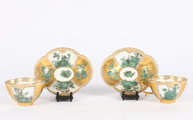 A PAIR OF MEISSEN GOLD-GROUND CUPS AND SAUCERS, CIRCA 1747.