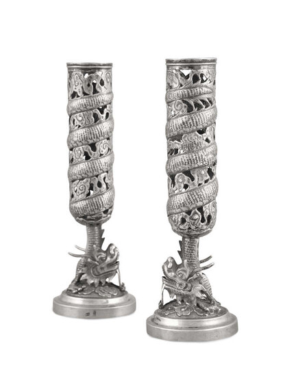 A PAIR OF PARTIALLY RETICULATED ‘DRAGON’ CANDLE HOLDERS...