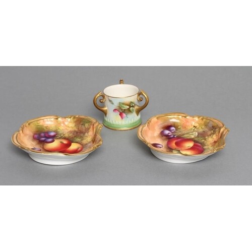 A PAIR OF ROYAL WORCESTER CHINA DISHES, 1933, of scrolling q...