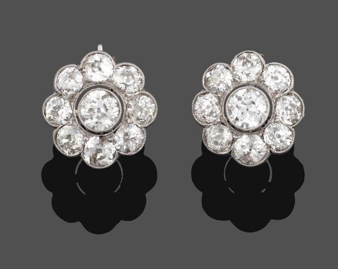 A Pair of Diamond Cluster Earrings, an old cut diamond within a border of eight smaller old cut...